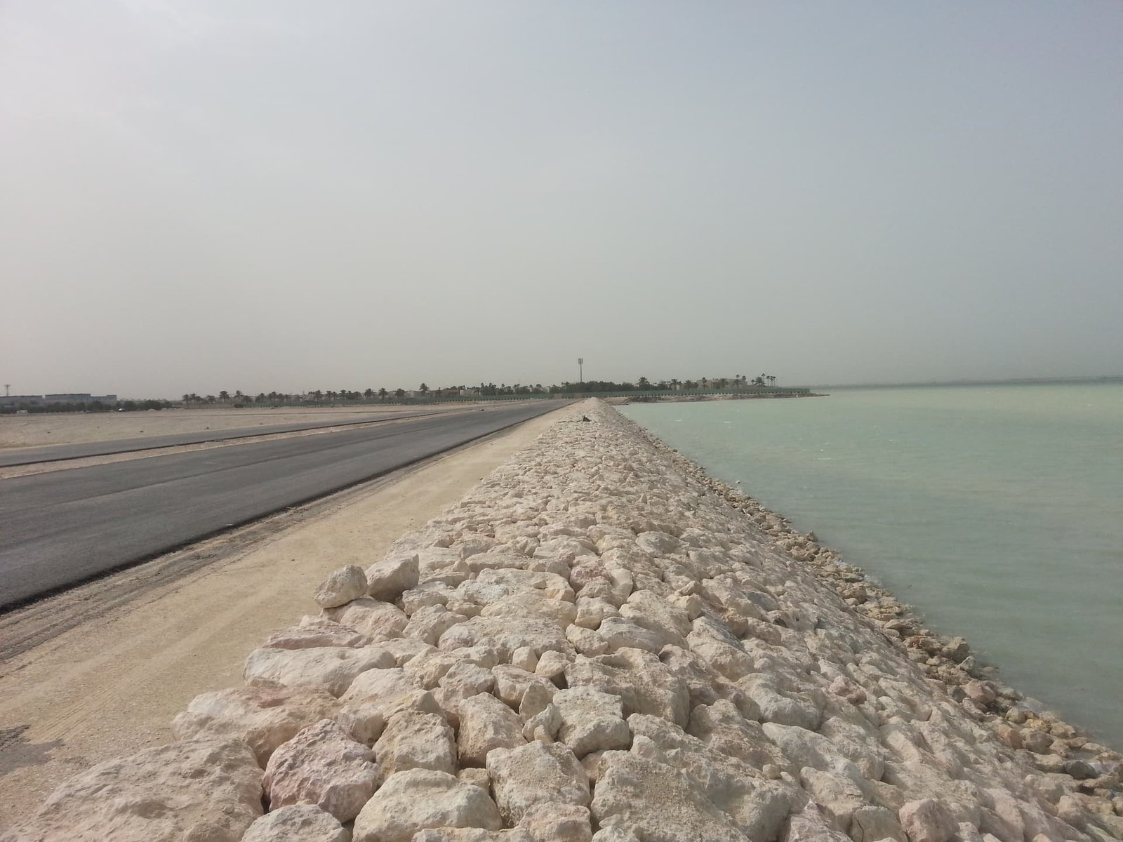 Coastal road with rock revetment embankment