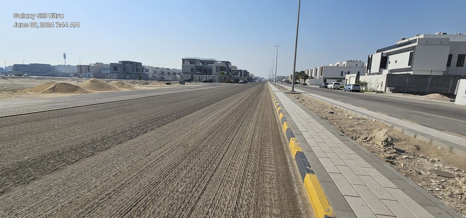Completed roundabout with palm landscaping